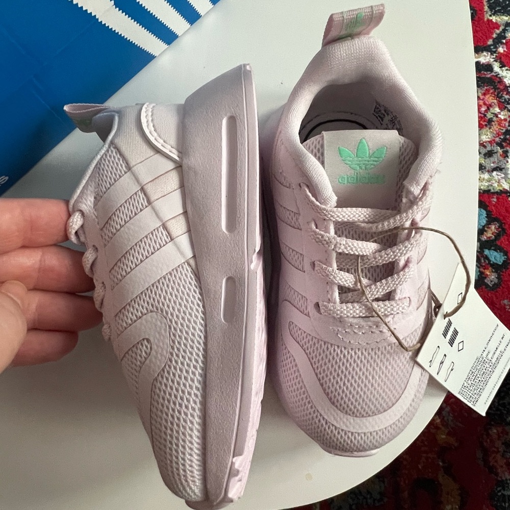 Size 5 Adidas Baby Multix sneaker in Almond Pink.